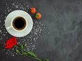 Cup with coffee on a texture table with poppy flower, strawberries and sprinkled chicken sugar