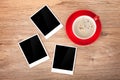 Cup of coffee and three photo frames Royalty Free Stock Photo