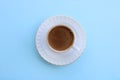 Cup of coffee top view, blue background, turkish coffee