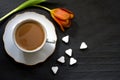 Cup of coffee with tulip and sugar heart valentine breakfast