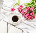 Cup of coffee and tulips Royalty Free Stock Photo