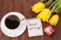 Cup of coffee, tulips and Good morning massage Royalty Free Stock Photo