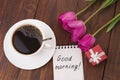 Cup of coffee, tulips and Good morning massage Royalty Free Stock Photo