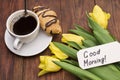 Cup of coffee, tulips and Good morning massage Royalty Free Stock Photo