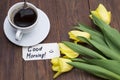 Cup of coffee, tulips and Good morning massage