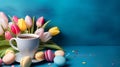 Cup of Coffee, Tulips and Macarons on blue background with copy space Royalty Free Stock Photo