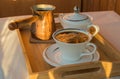 Cup of coffee, Turk, croissants on wooden plate closeup. Breakfast, Selective focus