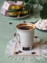 A cup of coffee and Turkish sweets. Sweet food in Ramadan. Royalty Free Stock Photo