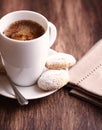 Cup of coffee and two biscotti. Royalty Free Stock Photo