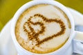 Cup of coffee with two hearts. It s symbol of Love in foam. It's a delicious Royalty Free Stock Photo