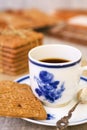 Cup of coffee with a typical Dutch speculaas cookie Royalty Free Stock Photo