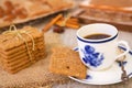 Cup of coffee with a typical Dutch speculaas cookie Royalty Free Stock Photo