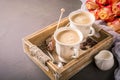 Cup of coffee in vintage wooden tray Royalty Free Stock Photo