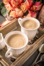 Cup of coffee in vintage wooden tray Royalty Free Stock Photo