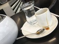 Cup of coffee with water glass
