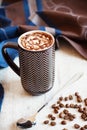 Cup of coffee with whipped cream and melted chocolate Royalty Free Stock Photo