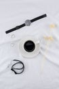 A cup of coffee with woman accessories