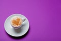 cup of coffee on the wonderful purple background