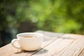 A cup of coffee on a wooden