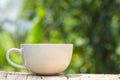 A cup of coffee on a wooden