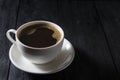 Cup of coffee on wooden table Royalty Free Stock Photo