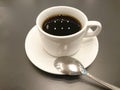 Cup of coffee on wooden table