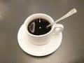 Cup of coffee on wooden table