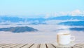 Cup of coffee on a wooden table Royalty Free Stock Photo