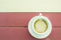 Cup of coffee on wooden table