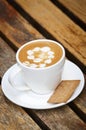 Cup of coffee on wooden table