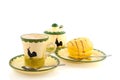 Cup of coffee with yellow cakes Royalty Free Stock Photo