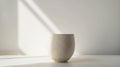 a cup crafted from minerals, set against a pristine white background for a striking contrast.