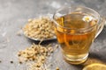 Cup of delicious camomile tea on table, closeup Royalty Free Stock Photo