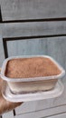 A cup of dessert box. Fudgy brownis, creamy Fla, melted ice cream and chocolate powder Royalty Free Stock Photo