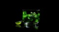 a cup of drink with lime and mint leaves on top Royalty Free Stock Photo