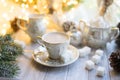 A cup of English tea with milk from an old mother-of-pearl porcelain service with refined sugar. Christmas tea party breakfast on Royalty Free Stock Photo