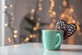 Cup of coffee with a sweet cookie Royalty Free Stock Photo