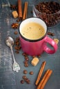 Cup of espresso, cinnamon sticks and coffee beans on a Shabby b Royalty Free Stock Photo