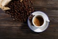 Cup of espresso with coffee beans close photographed from above Royalty Free Stock Photo