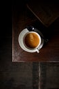 Cup of espresso coffee on an old wooden table. Top view Royalty Free Stock Photo