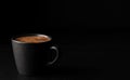 A cup of espresso with foam. Black stone background. Copy space for text. Close-up, shallow depth of field. Morning hours waiting