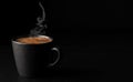 A cup of espresso with foam, steam rises above a cup of coffee. Black stone background. Copy space for text. Close-up, shallow Royalty Free Stock Photo