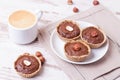 Cup of espresso, milk and cakes, close up, horizontal