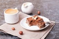 Cup of espresso, milk and cakes, close up, horizontal