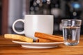 a cup of espresso, a small glass of sparkling water and cookies Royalty Free Stock Photo