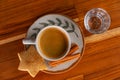 a cup of espresso, a small glass of sparkling water and cookies Royalty Free Stock Photo