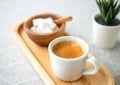 A cup of espresso on the wooden plate soft color tone picture relaxing idea with copy space Royalty Free Stock Photo