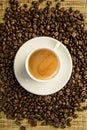 Cup of expresso coffee with roasted beans Royalty Free Stock Photo