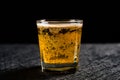 Cup of fresh beer on dark background Royalty Free Stock Photo