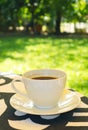 Cup of fresh brewed aromatic hot coffee on the table Royalty Free Stock Photo